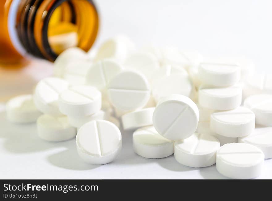 Pills Spilling out of Pill Bottle Shallow DOF