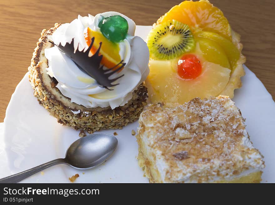 Three diferent cakes in a studio