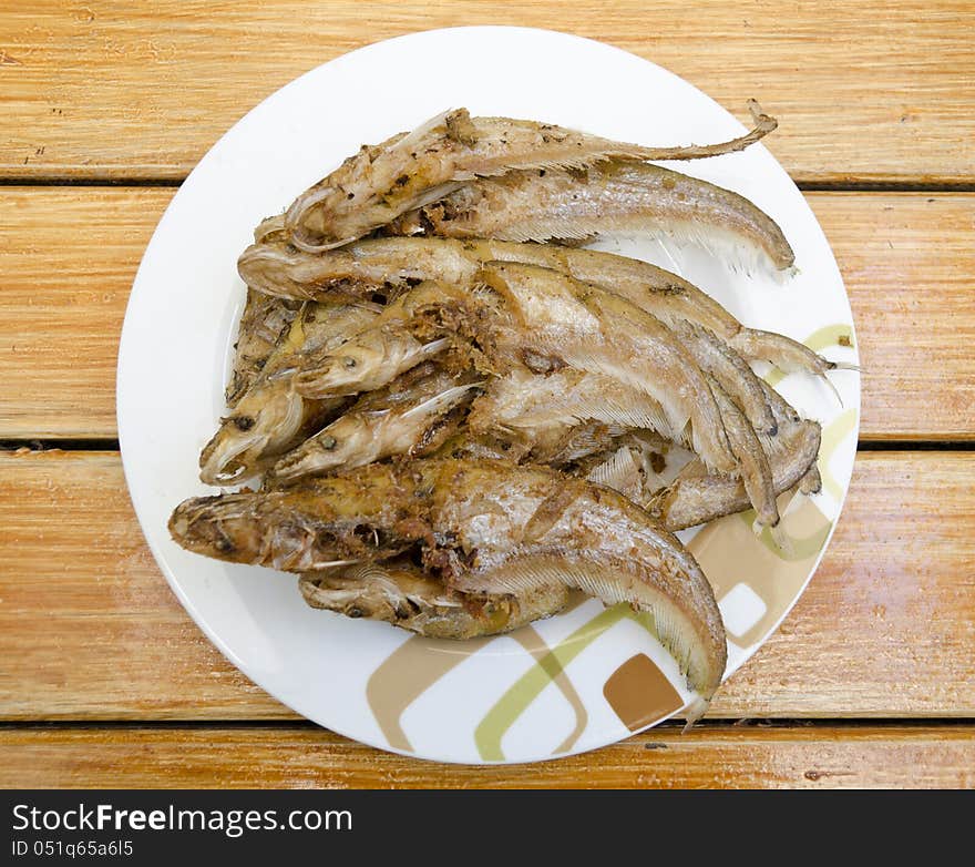 Fried fishes on dish, delicious thai food