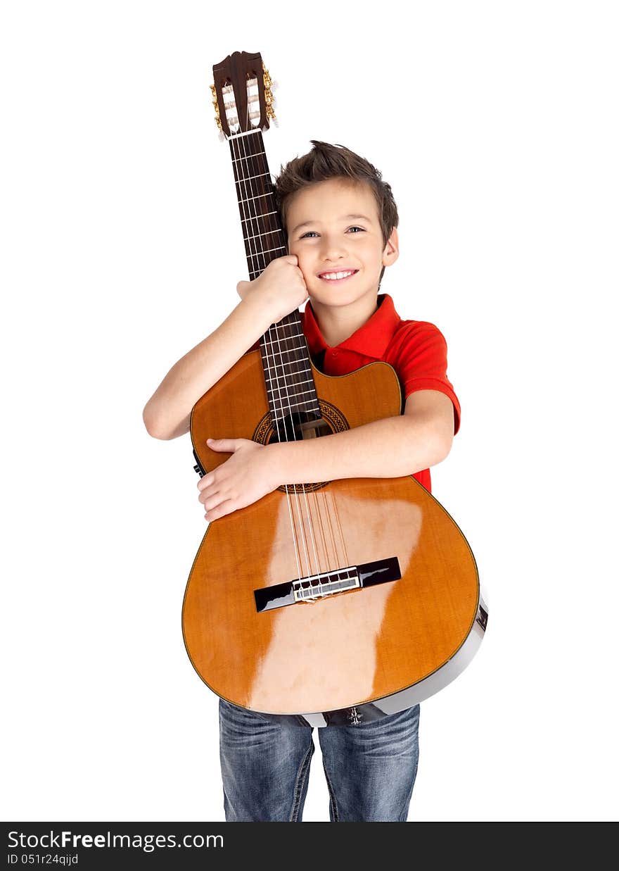 Smiling boy holding acoustic guitar