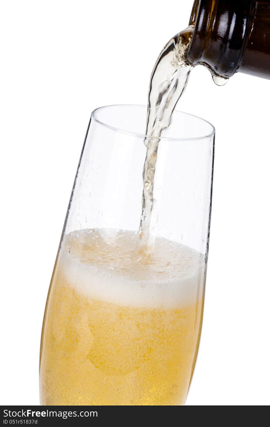 Bottle and glass of champagne  on white background