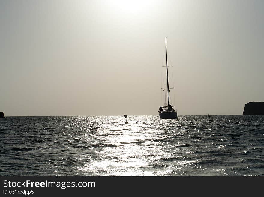 Sailboat in the sunlight/. Sailboat in the sunlight/