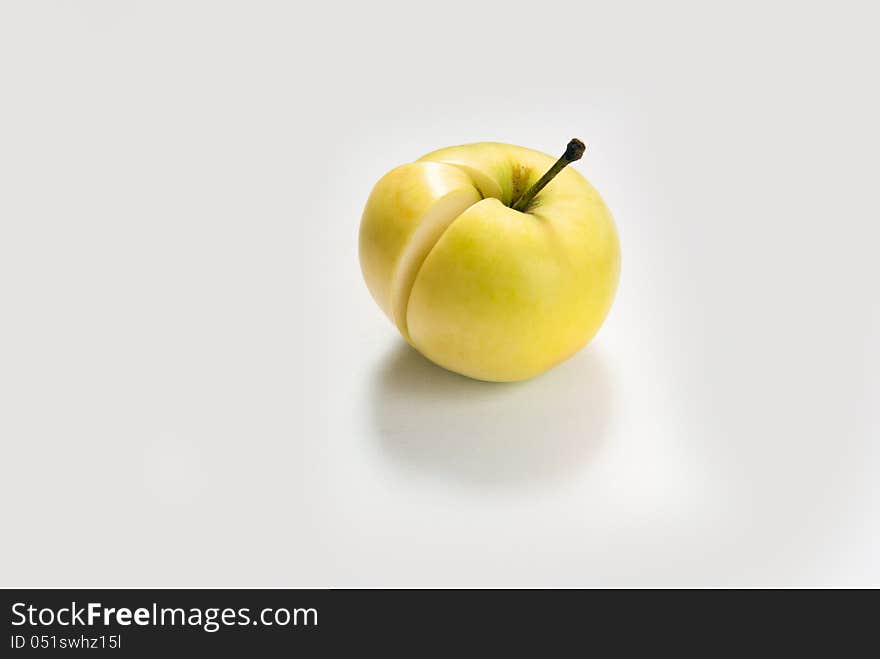 Golden apple on white background