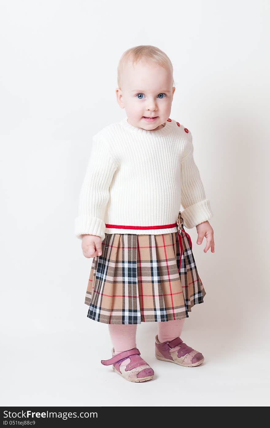 One year-old child in studio white background