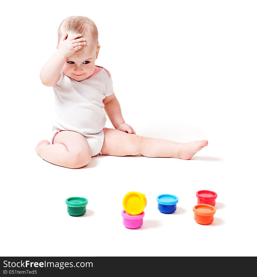 Year-old child playing with paints. Year-old child playing with paints