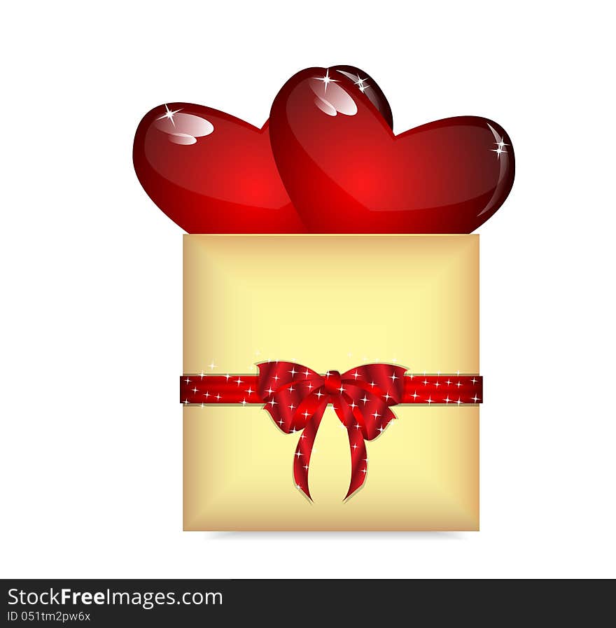 box of gold color with two hearts is decorated by a red ribbon. box of gold color with two hearts is decorated by a red ribbon