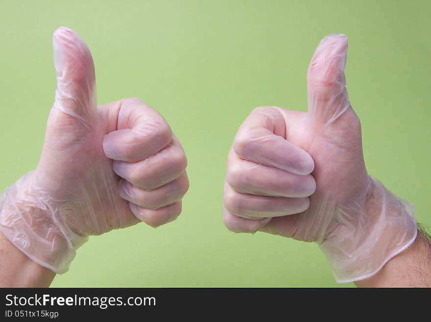 Doctor Showing Thumbs Up On Green Background