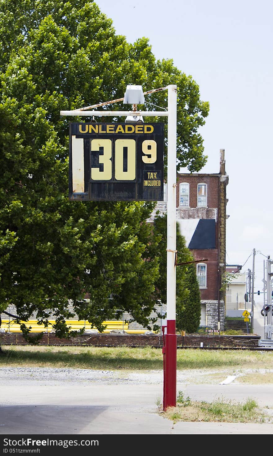 Service station sign showing the price of unleaded fuel in the 1990s. $1.30 per gallon of gas with tax of .09 cents. Service station sign showing the price of unleaded fuel in the 1990s. $1.30 per gallon of gas with tax of .09 cents.