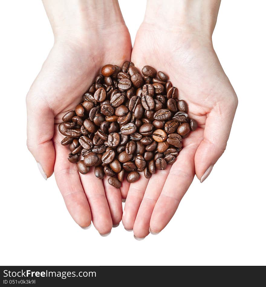 Cupped hands holding coffee beans. Cupped hands holding coffee beans