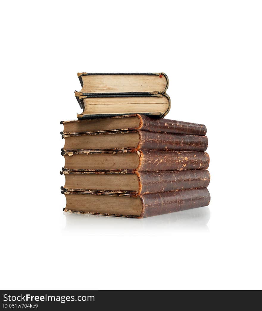 Stack of old books on white background. Clipping path is included. Stack of old books on white background. Clipping path is included