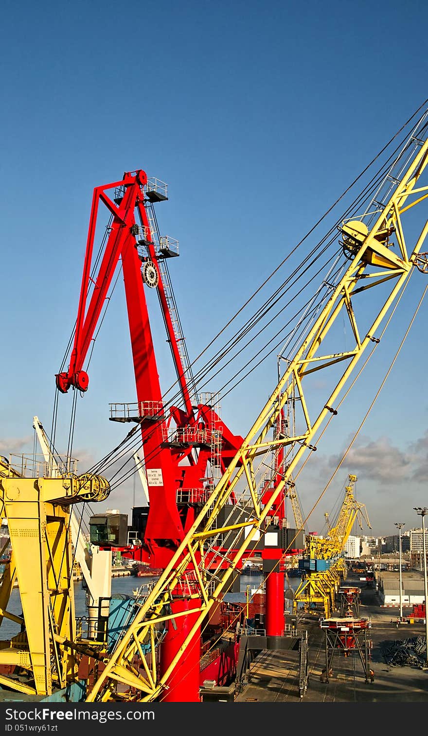 Some cranes in a port