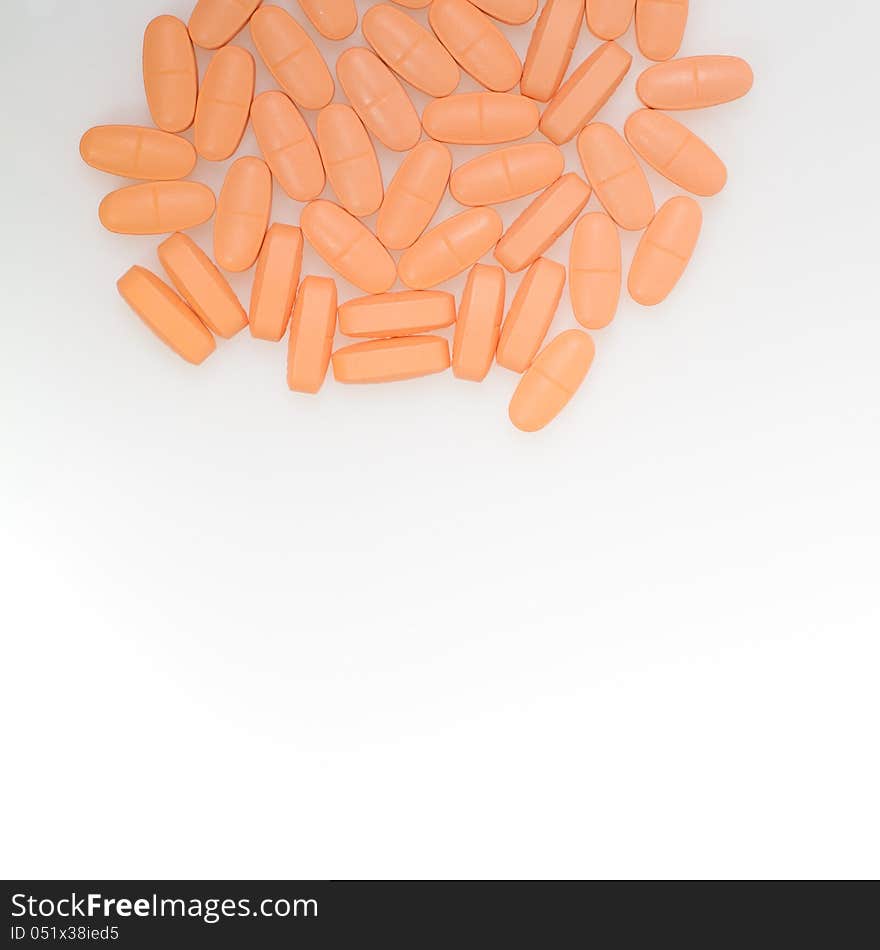 Pills on the white backing