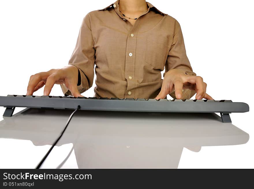 Woman hand typing on black computer keyboard over white background. Woman hand typing on black computer keyboard over white background