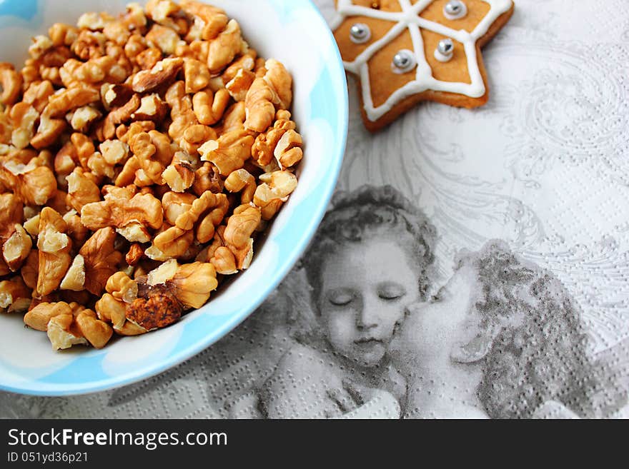 Christmas preparation background with angels and walnuts