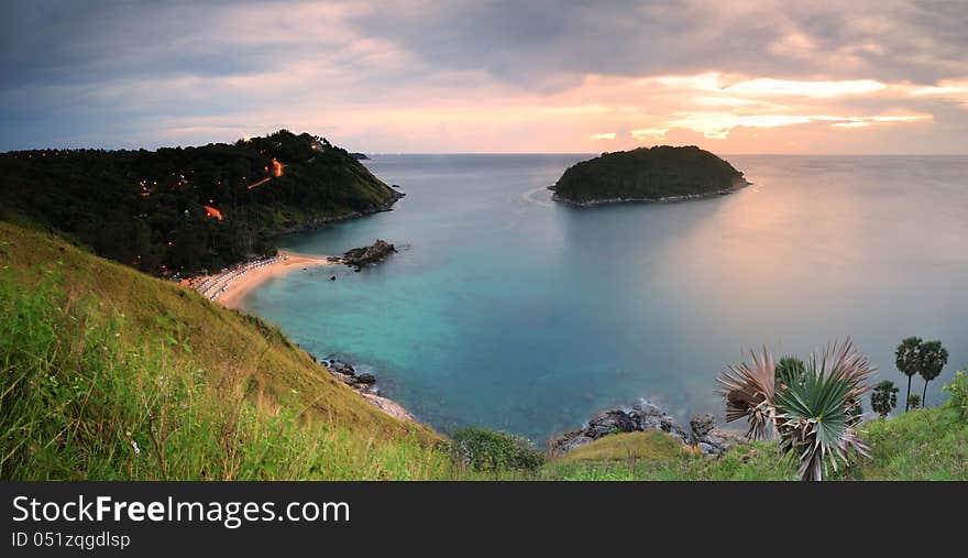 Cape is a mountain of rock that extends into the sea in Phuket, Thailand. Cape is a mountain of rock that extends into the sea in Phuket, Thailand