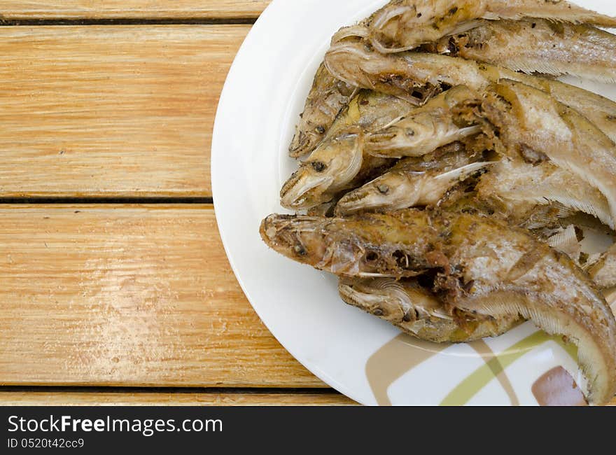 Fried fish on dish, delicious thai food