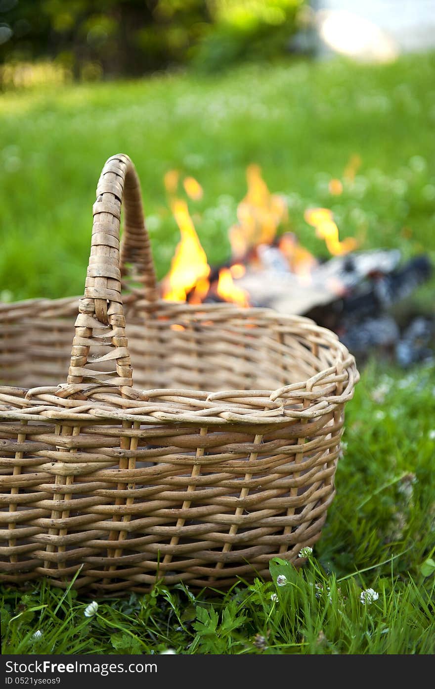 Basket and camp fire in the village