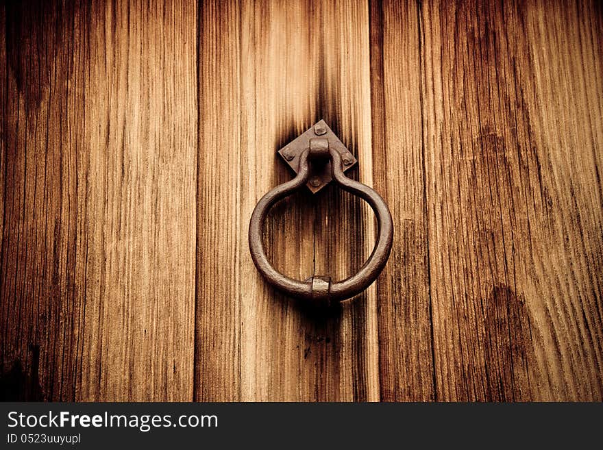 Old fashioned wooden door and knocker. Old fashioned wooden door and knocker