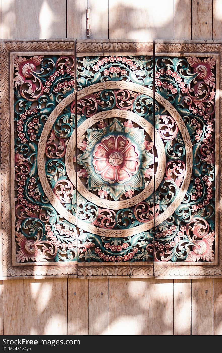 The architecture of flower on a wood carving wall. The architecture of flower on a wood carving wall