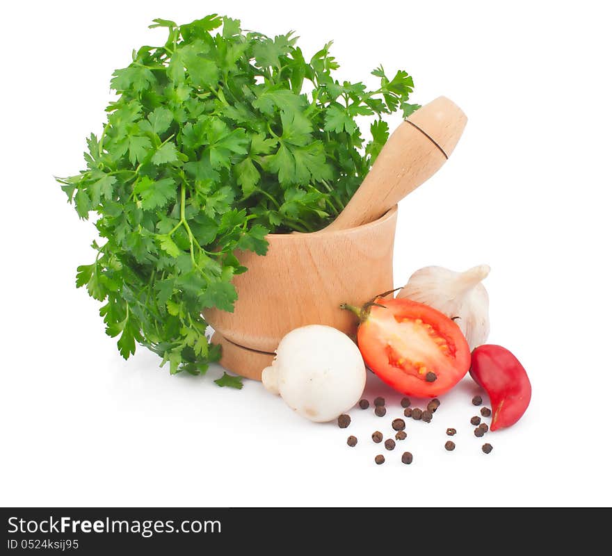 Wooden mortar with parsley, tomato and spices, food ingredient photo. Wooden mortar with parsley, tomato and spices, food ingredient photo