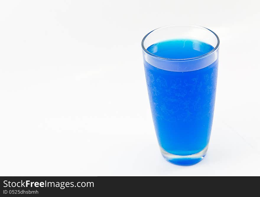 Glass and blue water on a white background.