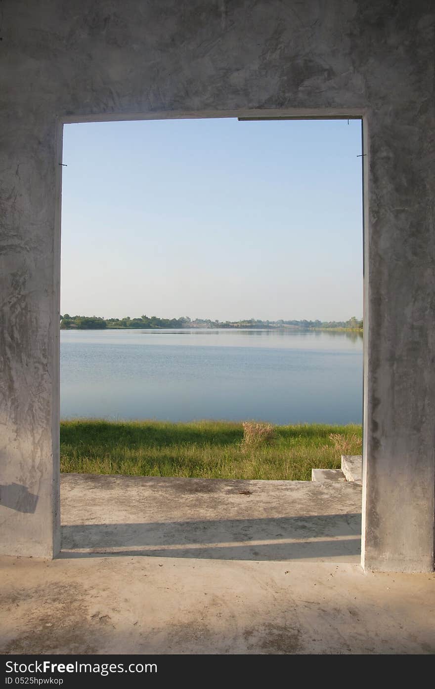 Looking Out Of Open Door Upon Lake