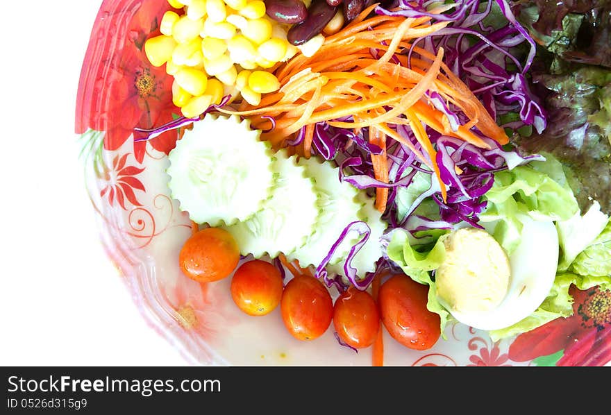 Greece salad at plate isolated on a white