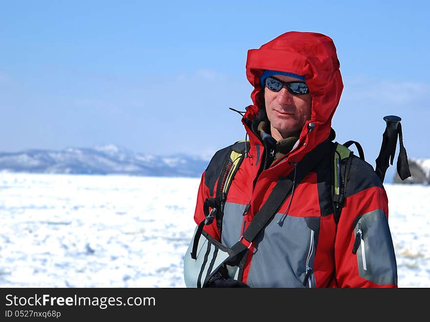 Happy hiker in Kamchatka. The Pacific coast.