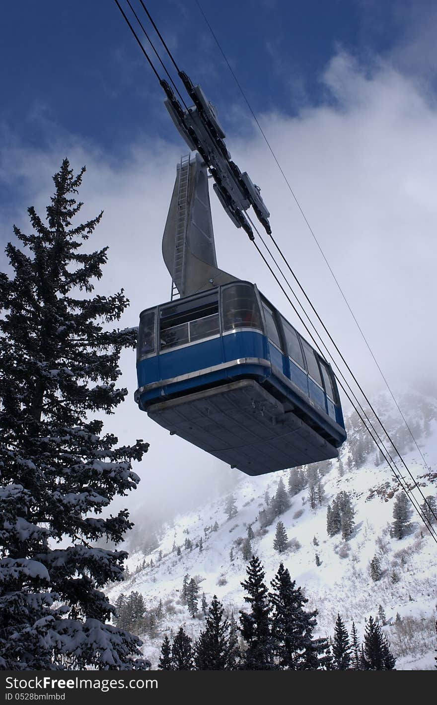 View to the mountains and blue ski tram at Snowbird ski resort in Utah