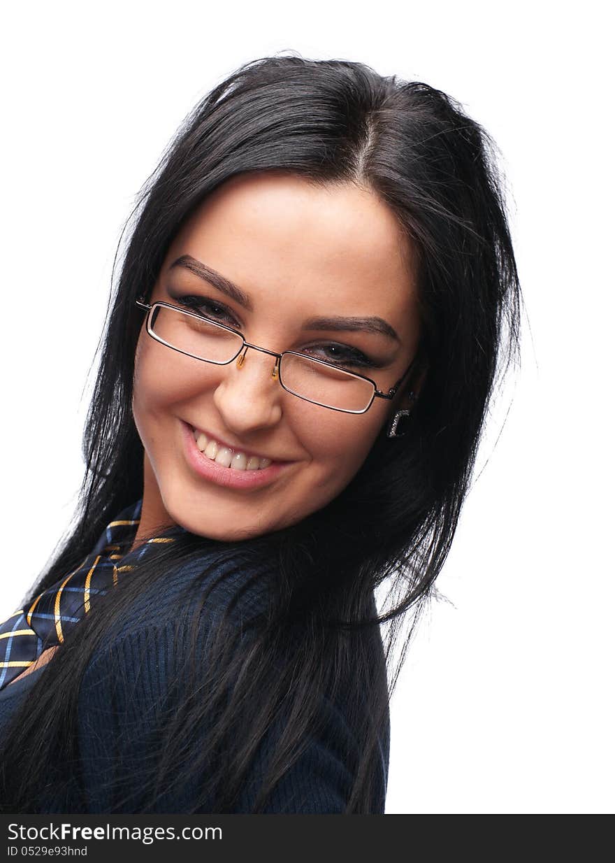 Beautiful young girl in glasses wearing a tie on a white background