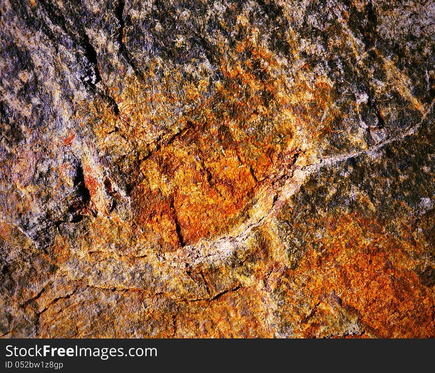 Texture stone plate as the ancient caves in fiery colors