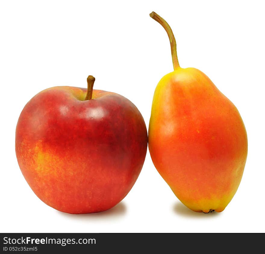 Yellow pear and red apple isolated on a white background