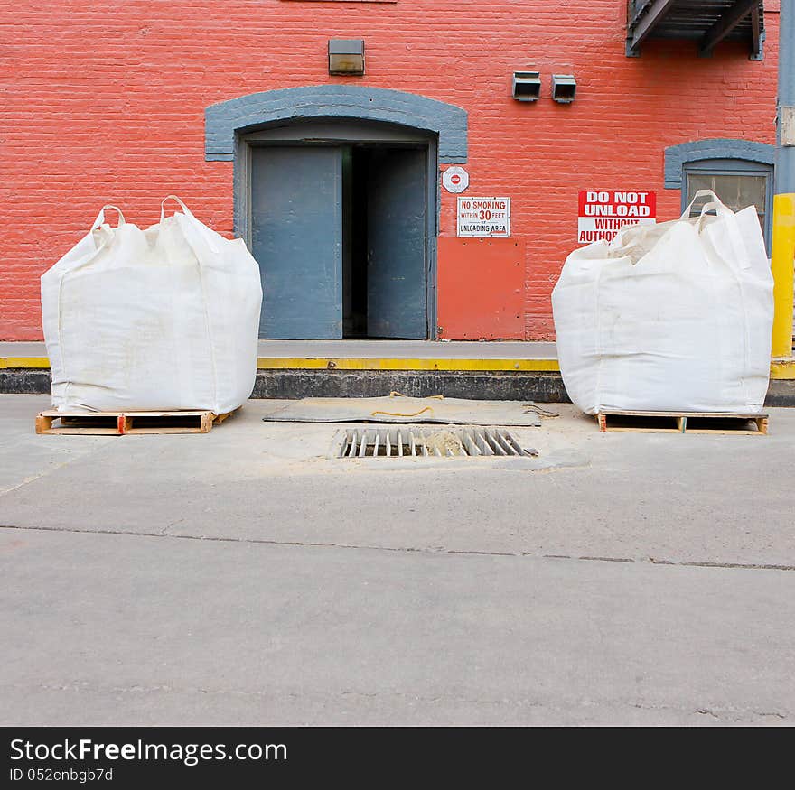 Bales of grain waiting to be processed. Bales of grain waiting to be processed.