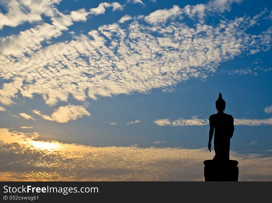 Silhouette of buddha statue