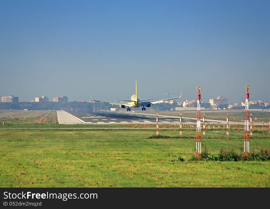 Passenger plane landing in the airport. Passenger plane landing in the airport