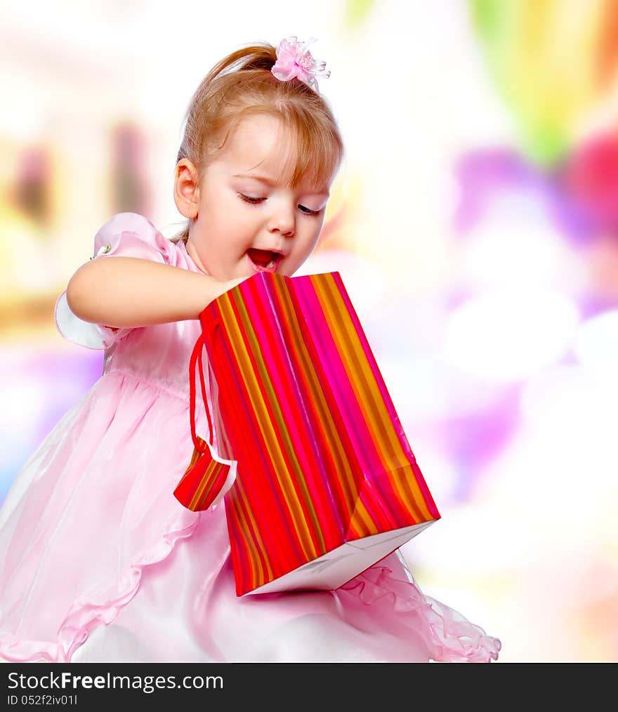 Girl In The Mall Holding A Gift