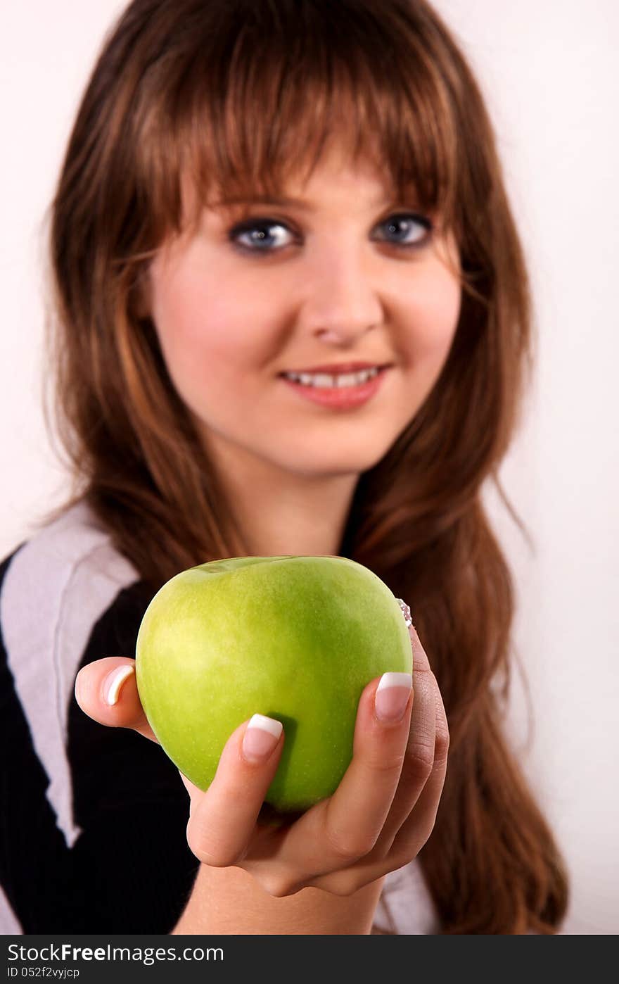 Teen girl and an apple.