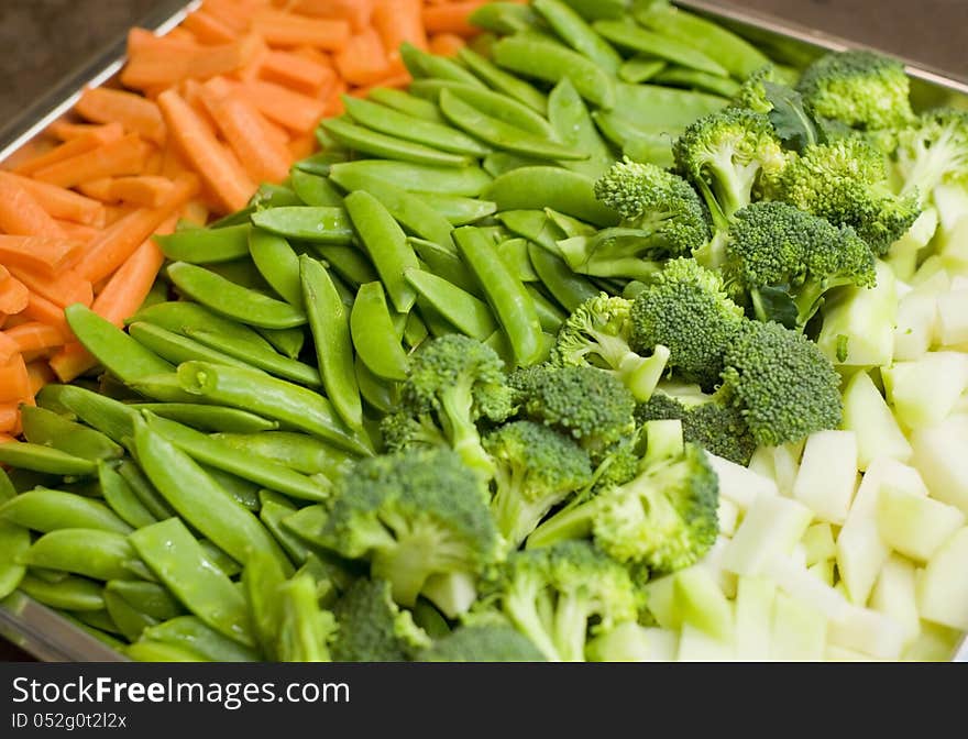 Image shows a large plate of different fesh vegetables as closeup. Image shows a large plate of different fesh vegetables as closeup.