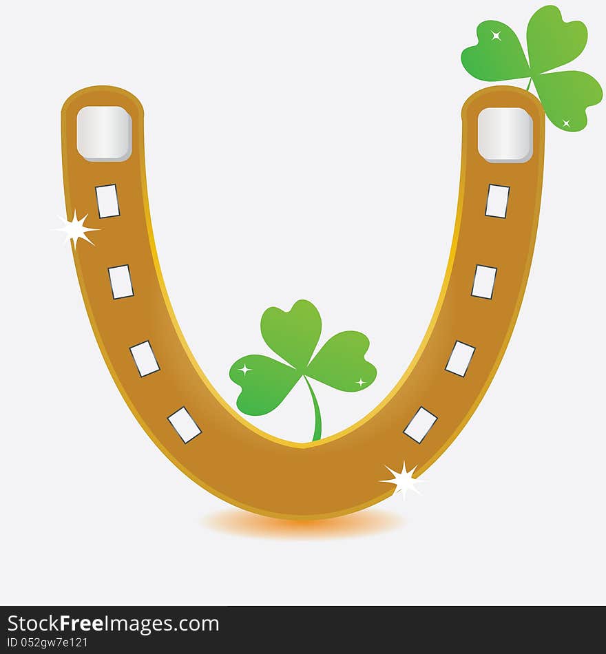 Horseshoe and four leaf clover.vector