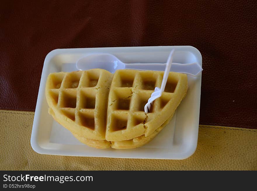 Freshly baked waffles with Fresh strawberries.