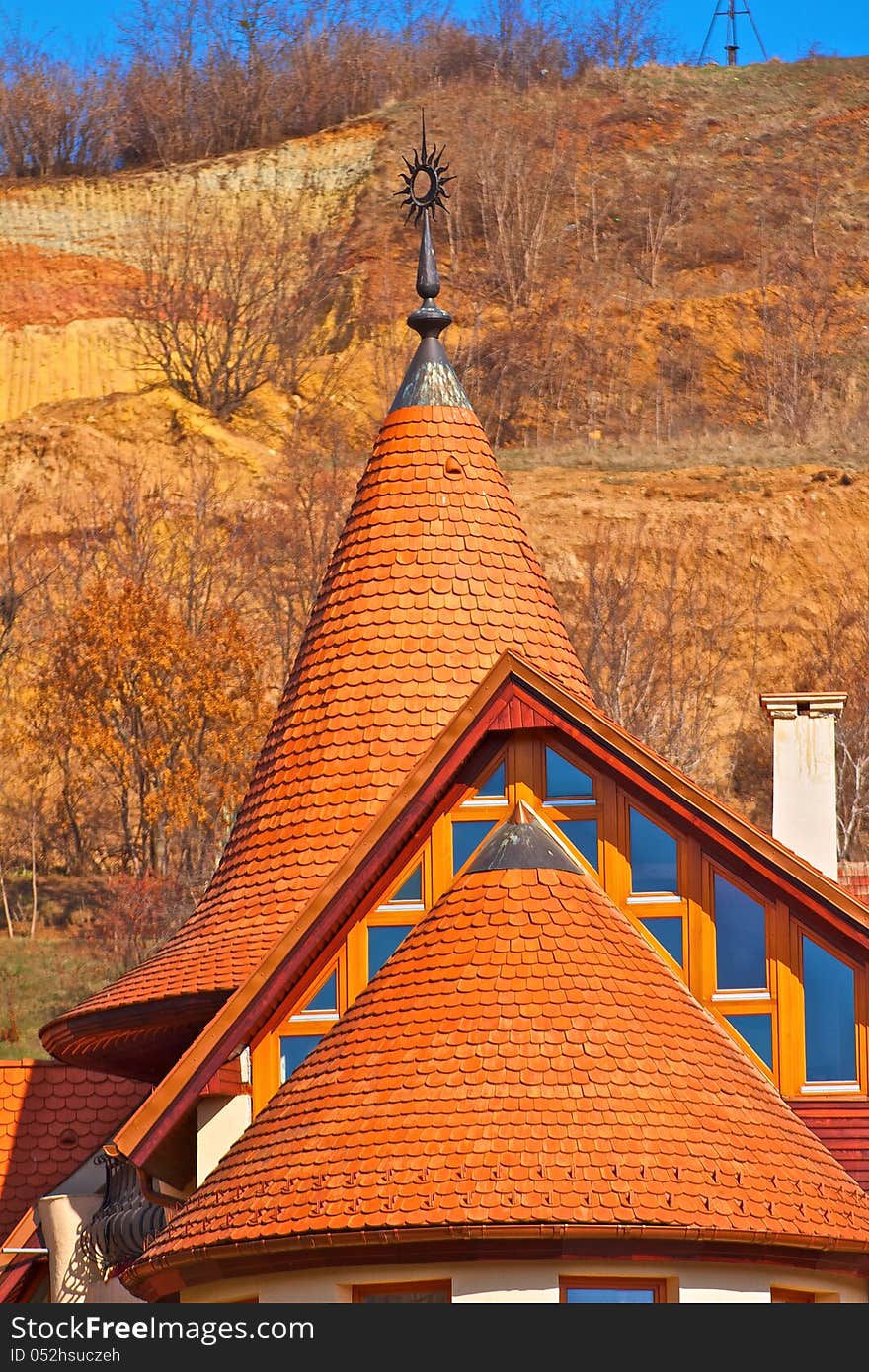 Traditional colored roof background texture with a window. Traditional colored roof background texture with a window