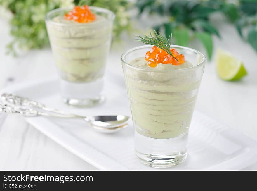 Avocado mousse with caviar and lime portions