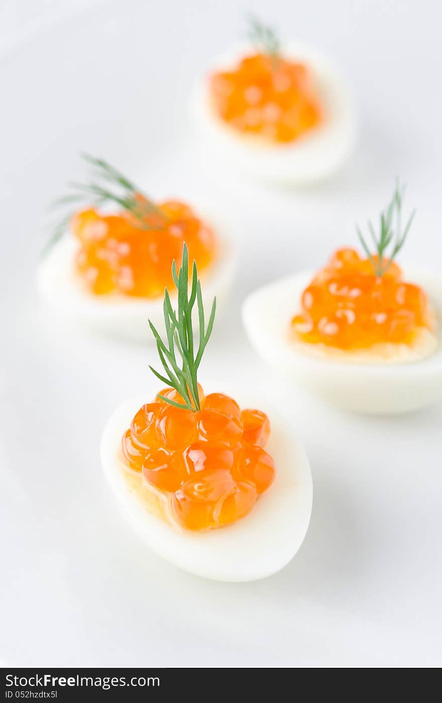 Quail eggs with caviar and dill