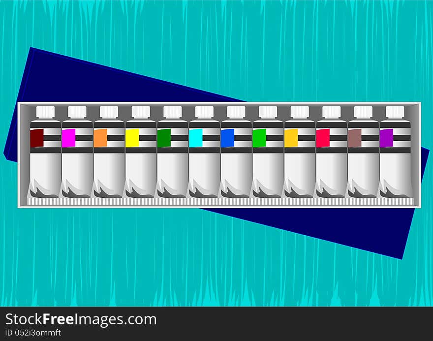 A set of tubes of paint, in a box, in the background is not full colored canvas. A set of tubes of paint, in a box, in the background is not full colored canvas.