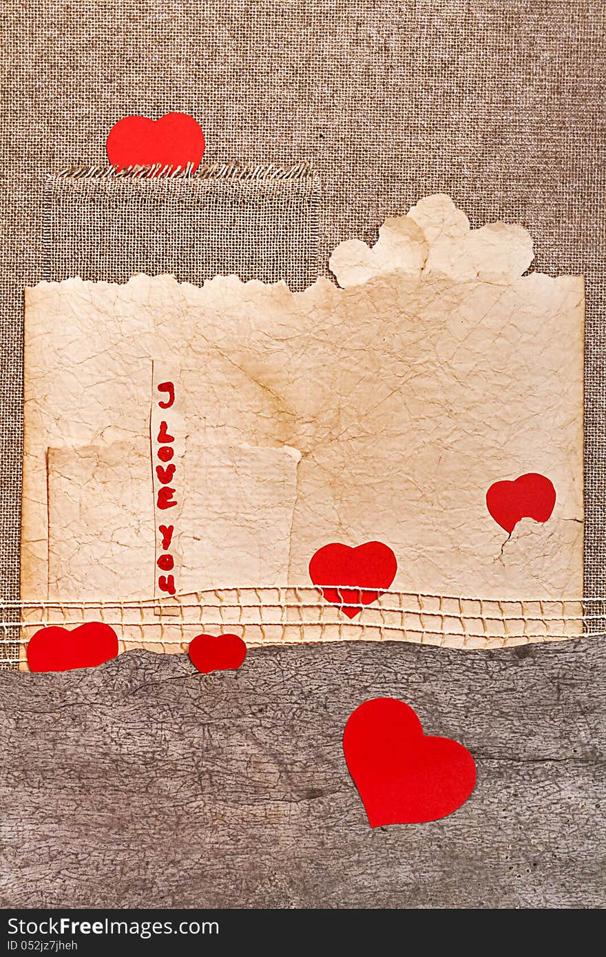 Art greeting card on vintage background with heart, old paper, fabric and words I Love You