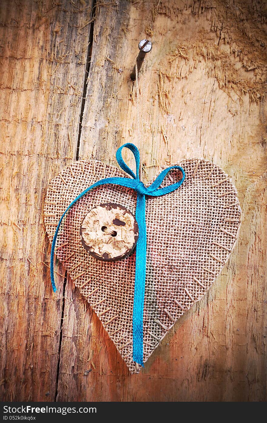 Decoration On Wooden Background With Fabric Heart