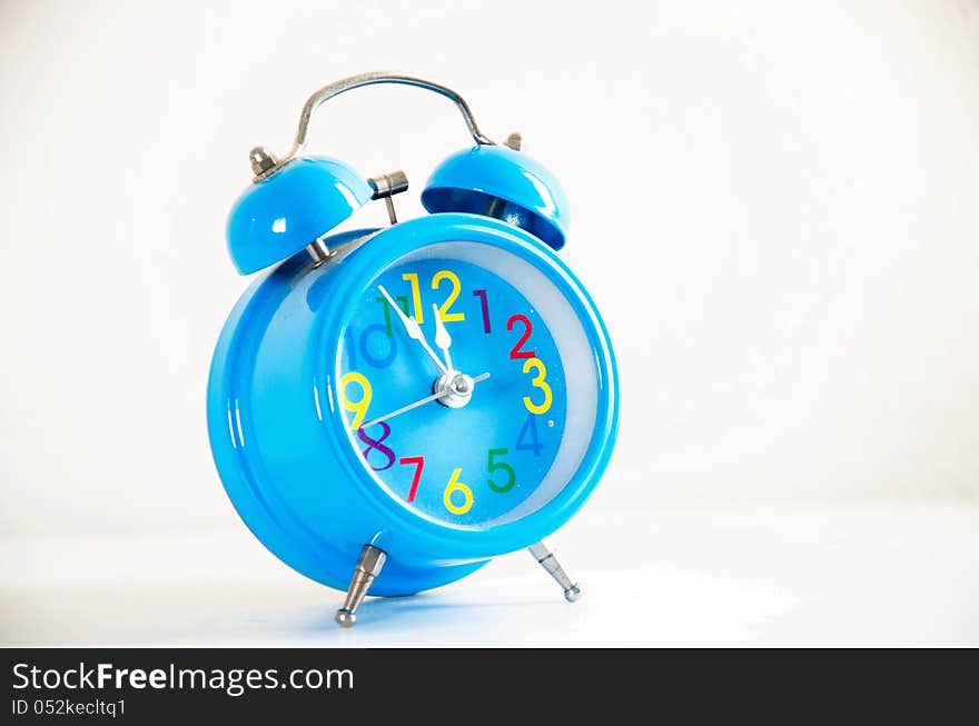 Alarm clock on white background.