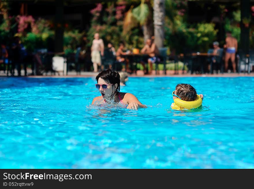 Family rest in pool