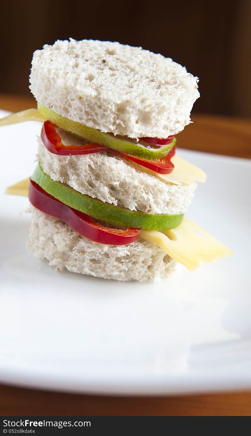 Small sandwich served as appetizer at parties