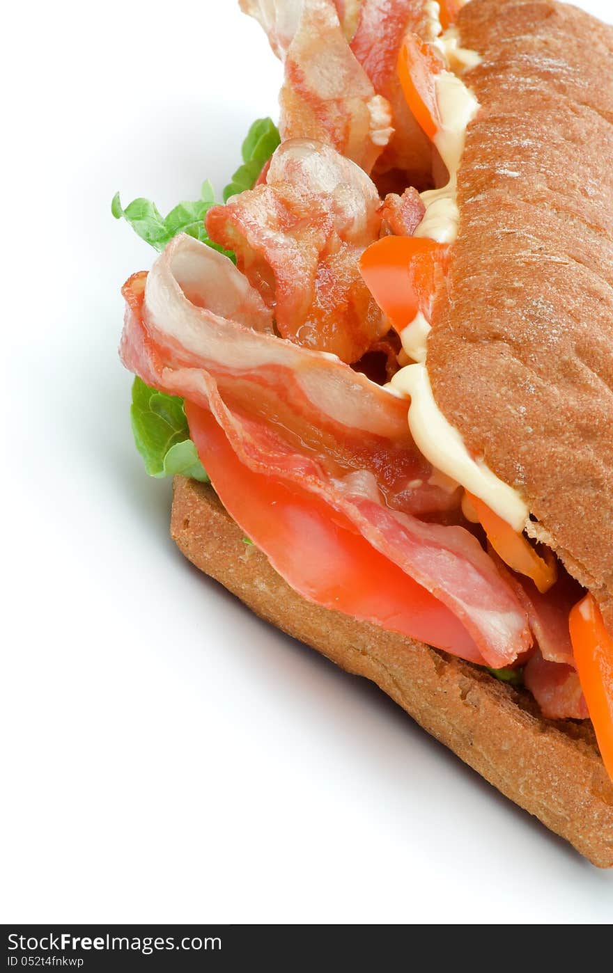 Big Tasty Ciabatta Sandwich with Fried Bacon, Lettuce, Tomato and Cheese Sauce isolated on white background. Big Tasty Ciabatta Sandwich with Fried Bacon, Lettuce, Tomato and Cheese Sauce isolated on white background